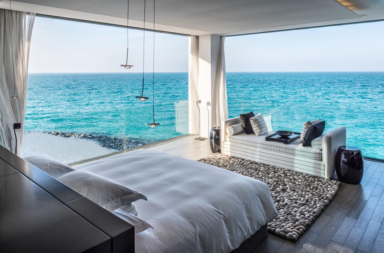 Nurai Island, Saadiyat Otel Abu Dabi Oda fotoğraf The bedroom of a private villa at the resort